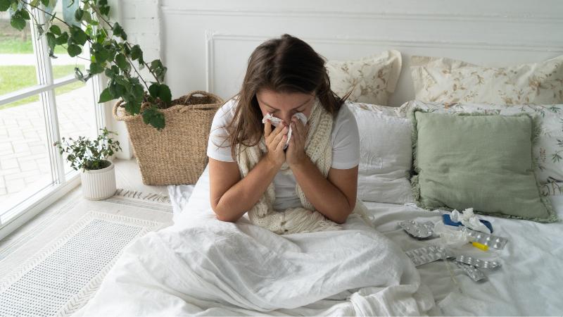 women in bed sick